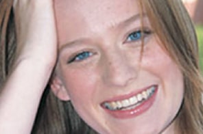 After Invisalign treatment at Elvebak Orthodontics in Plano, TX, with an improved smile.