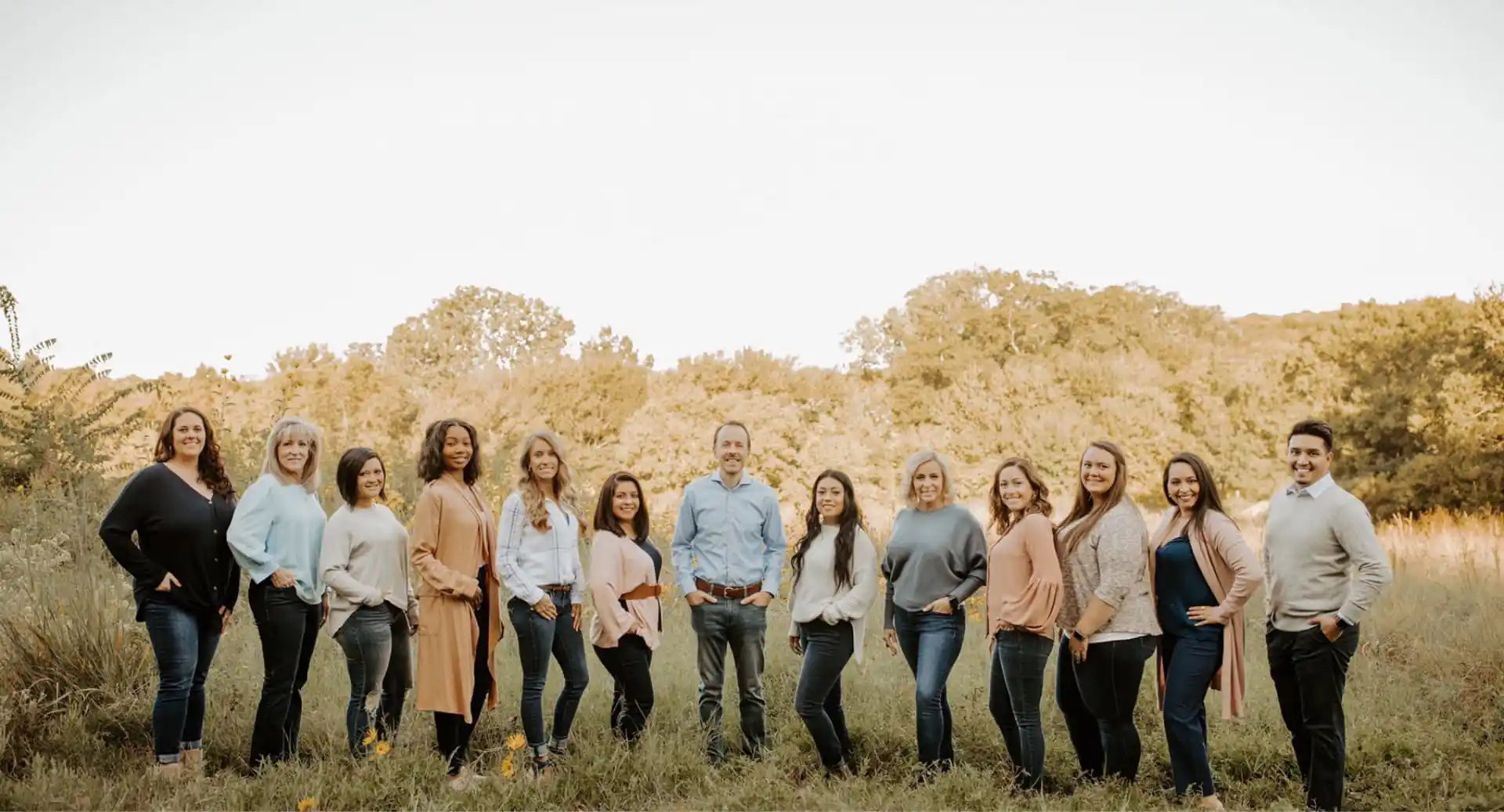 Dr. Bryan Elvebak with his orthodontic team in Plano, TX, providing braces and Invisalign care for kids, teens, and adults.